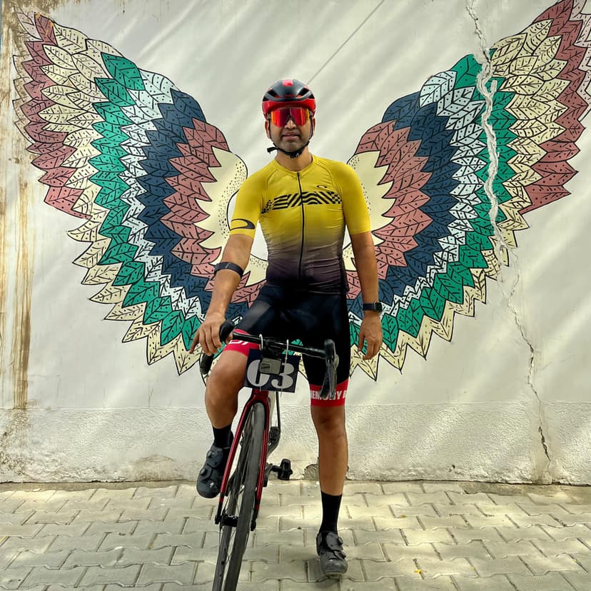 Sanjeev with cycling wings art